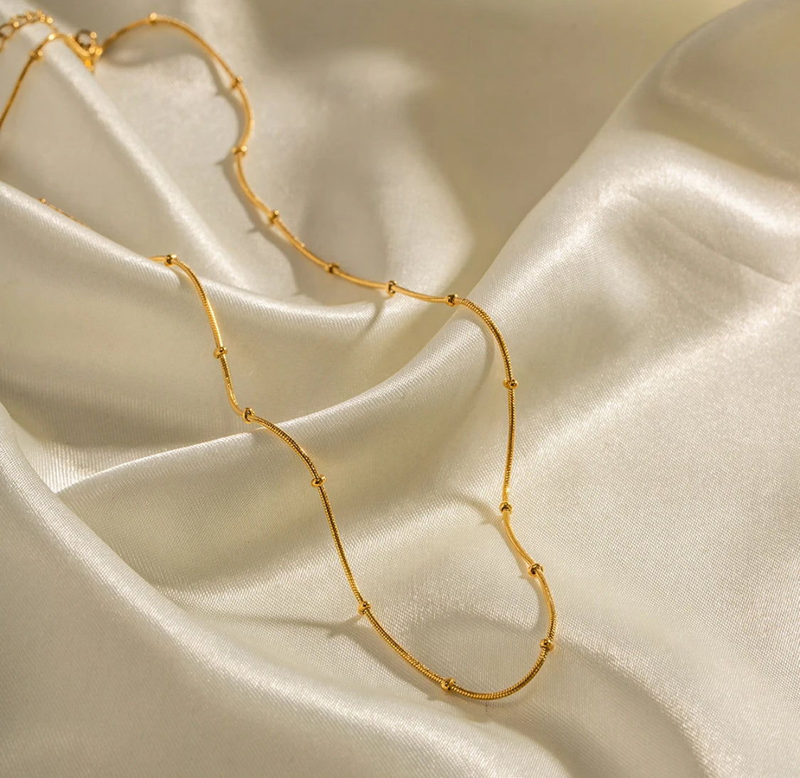 Snake and Ball Gold Chain