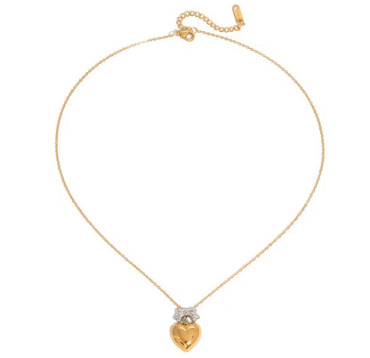 Two Toned Bow Heart Pendant